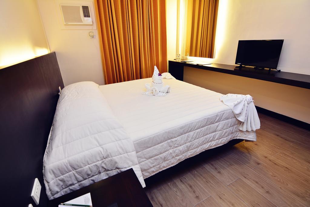 Citystate Asturias Hotel Palawan Puerto Princesa Екстер'єр фото